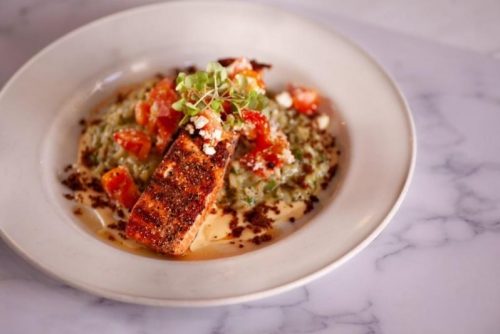 Blackened salmon over risotto