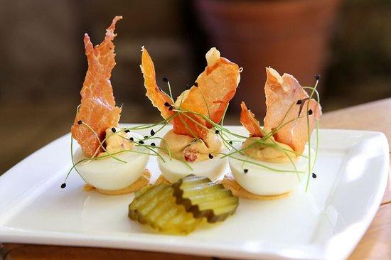 Elegant deviled eggs with prosciutto